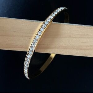 VINTAGE SIGNED AVON FAUX DIAMOND BANGLE BRACELET